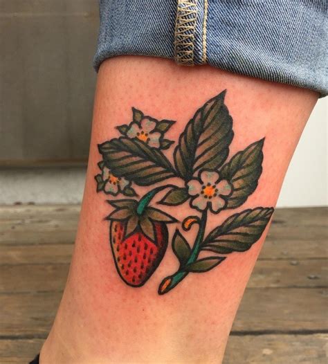 strawberry vine tattoo|american traditional strawberry tattoo.